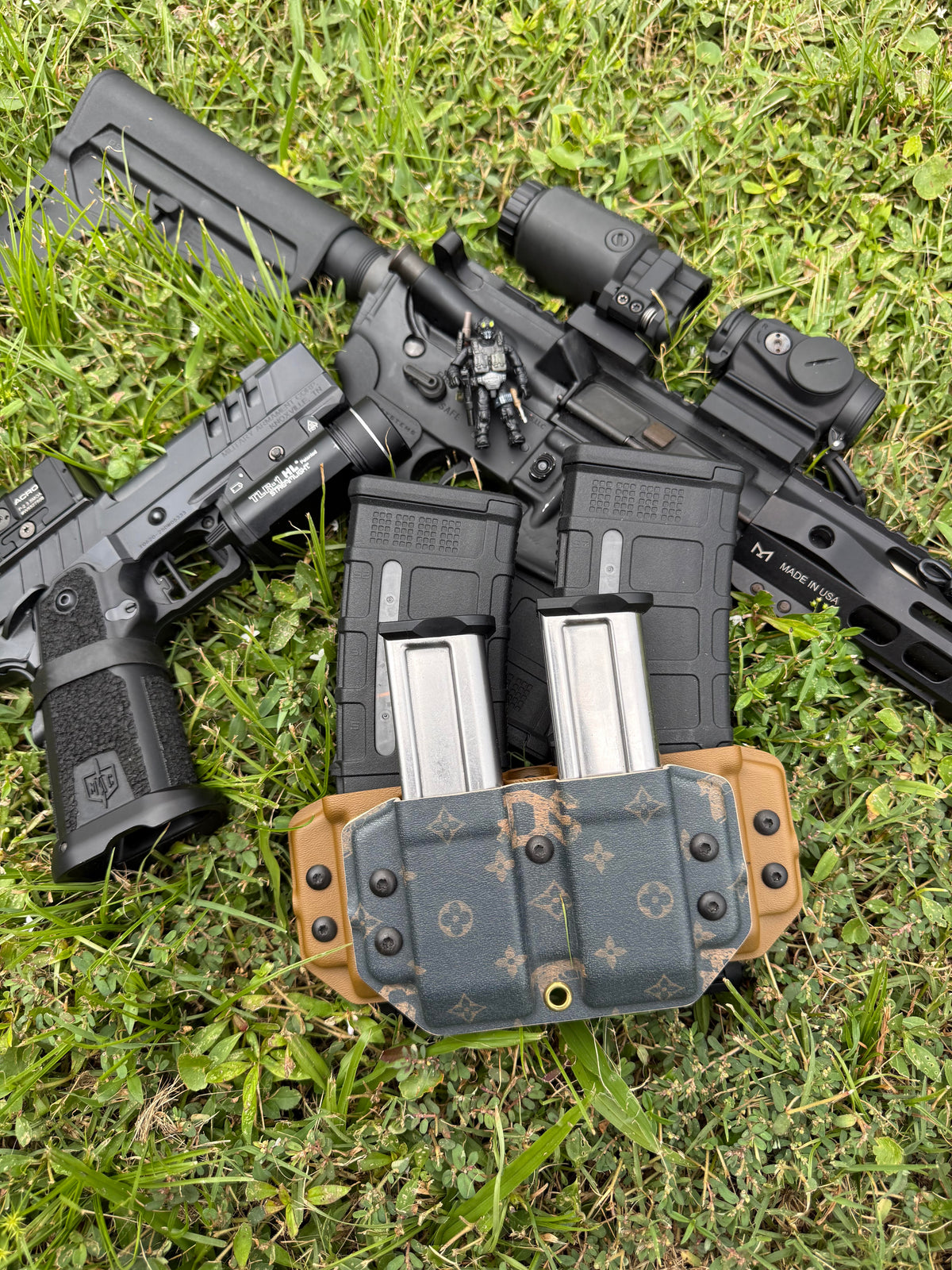 Four Horsemen Mag Carrier shown with magazines in an outdoor gear setup
