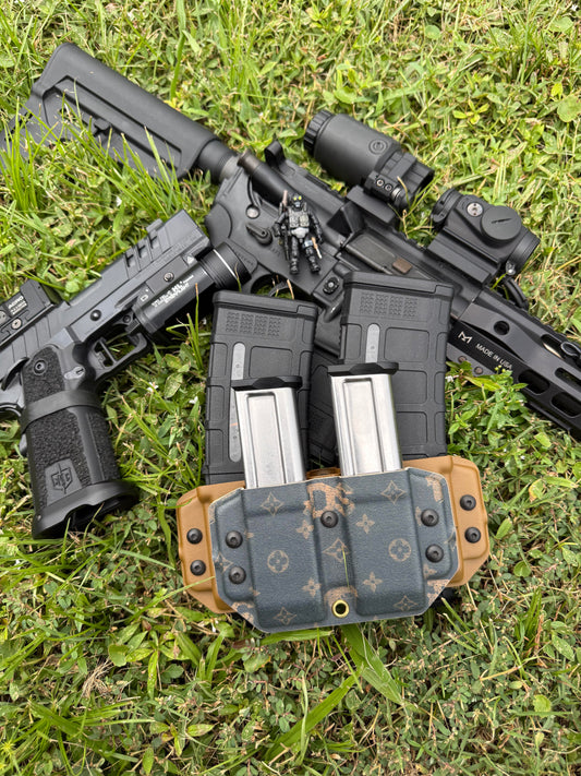 Four Horsemen Mag Carrier shown with magazines in an outdoor gear setup